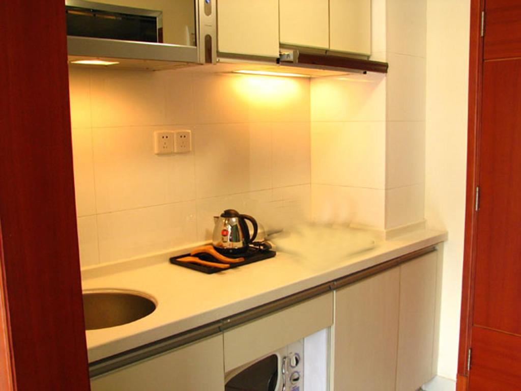 Estay Apartments Guangzhou Rum bild